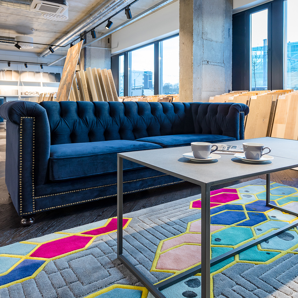 A quality hand tufted area rug made of wool from New Zealand for an interior design salon